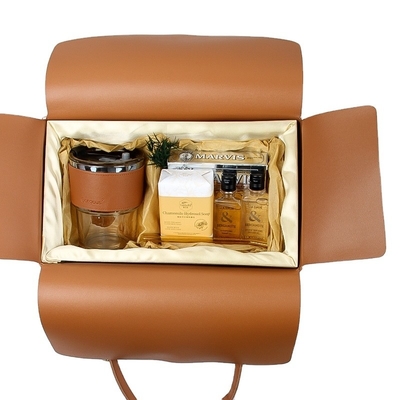 Ensemble de cadeaux en cuir à main portante pour affaires Crème dentaire Gel de douche Shampooing Sabon Manche de tasse