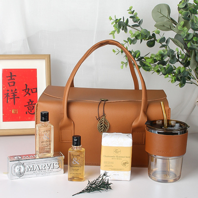 Ensemble de cadeaux en cuir à main portante pour affaires Crème dentaire Gel de douche Shampooing Sabon Manche de tasse
