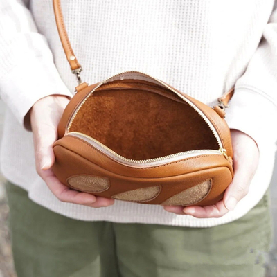 Journée du fou de texture maquillage sac de rangement mignon petit pain sac crossbody pour les activités