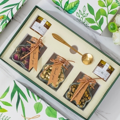 La boîte cadeau de thé à fleurs préférée de l'agence de voyages de la série de forêts de cadeaux à main pour les festivals