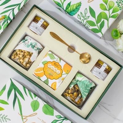 La boîte cadeau de thé à fleurs préférée de l'agence de voyages de la série de forêts de cadeaux à main pour les festivals
