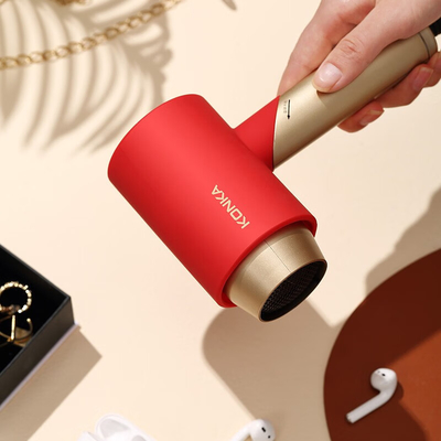 Le séchoir à cheveux pliable et portable de l'agence de voyage avec protection contre le vent chaud