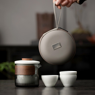 Ensemble cadeau de présentation Dongli Voyage Express Ensemble de tasse Portable Sac rond Un pot Trois tasses Ensemble de thé d'affaires cadeau