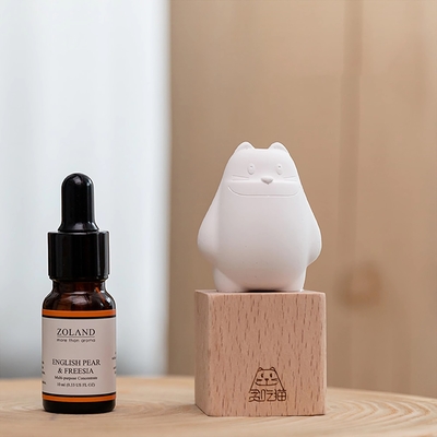 La poudre de parfum de chat avide Petit siège Canglan huile essentielle cadeau d'affaires pour le présent