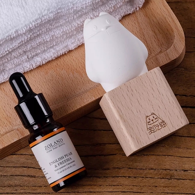 La poudre de parfum de chat avide Petit siège Canglan huile essentielle cadeau d'affaires pour le présent