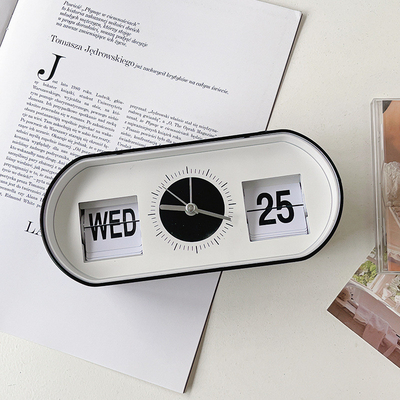 Horloge de réveil de bureau à bouton manuel avec calendrier créatif