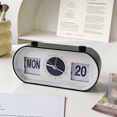 Horloge de réveil de bureau à bouton manuel avec calendrier créatif