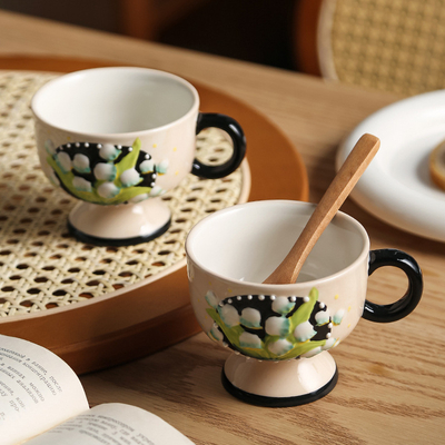 Agence de voyages Essentiels Peint à la main lilie de la vallée tasse de café en céramique de Finlande