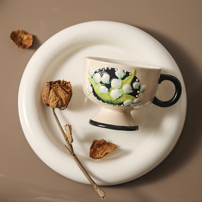 Agence de voyages Essentiels Peint à la main lilie de la vallée tasse de café en céramique de Finlande