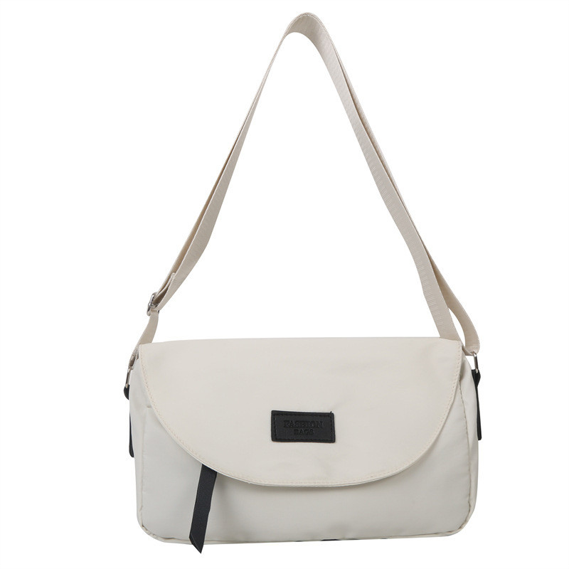 Logo du client Sac de voyageur à la mode Couleur solide Sac transversale simple Cadeau d'employé